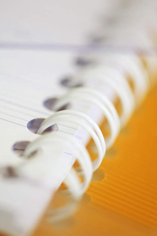 无人,竖图,俯视,室内,特写,白天,一本,黄色背景,朦胧,模糊,记事本,本子,笔记本,摄影,影棚,彩图,高角度拍摄,影棚拍摄,拍摄