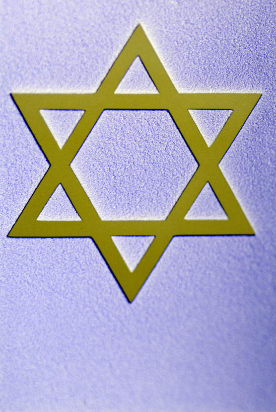 无人,竖图,室内,特写,白天,正面,神秘,静物,形状,节日,朦胧,模糊,墙,几何,文化,墙壁,墙面,黄色,白色,祈祷,健康,许愿,宗教,信仰,纪念,祈求,六芒星,犹太教,奥秘,挑筋教,平安,彩图