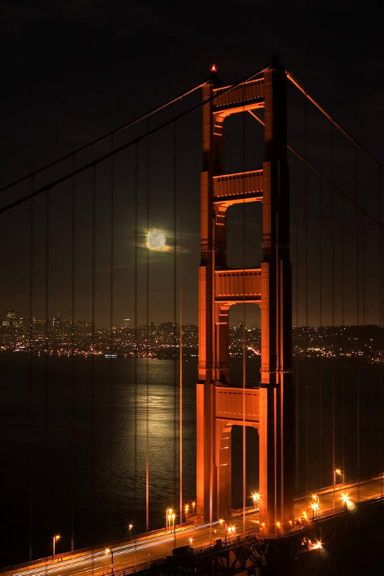 无人,高楼大厦,竖图,室外,夜晚,正面,度假,海浪,海洋,美景,城市风光,标志建筑,城市,大桥,大厦,地标,建筑,摩天大楼,桥梁,美国,波纹,景观,浪花,月亮,桥,月光,娱乐,建设,现代,拱桥,水纹,海水,波浪,享受,休闲,景色,放松,吊桥,人行桥,悬索桥,明亮,北美,北美洲,加利福尼亚,美洲,吊杆,金门大桥,海景,加州,加利福尼亚州,金州,黄金州,金门海峡,桁架拱桥,北亚美利加洲,亚美利加洲,兴旺,皎洁,锚锭,悬索,发达,蓬勃,大海,风浪,海,海水的波动,近岸浪,涌浪,彩图,大楼,高层建筑,高楼,摩天楼