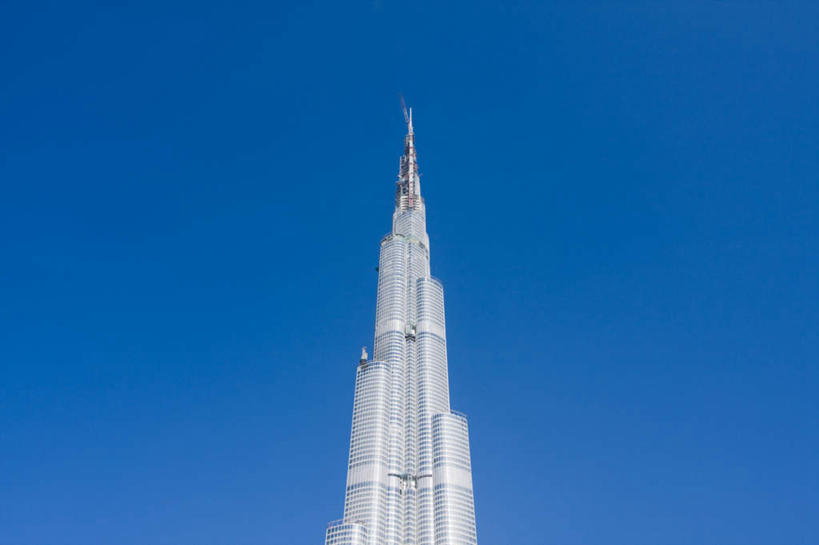 无人,高楼大厦,横图,室外,白天,仰视,度假,美景,城市风光,标志建筑,城市,大厦,地标,建筑,摩天大楼,阿联酋,亚洲,阴影,繁华,光线,影子,景观,娱乐,建设,蓝色,蓝天,天空,阳光,天,享受,休闲,景色,放松,晴朗,尖塔,西亚,阿拉伯联合酋长国,迪拜,万里无云,迪拜塔,哈利法塔,比斯迪拜塔,繁荣,杜拜,发达,迪拜大厦,晴空,晴空万里,彩图,低角度拍摄,大楼,高层建筑,高楼,摩天楼