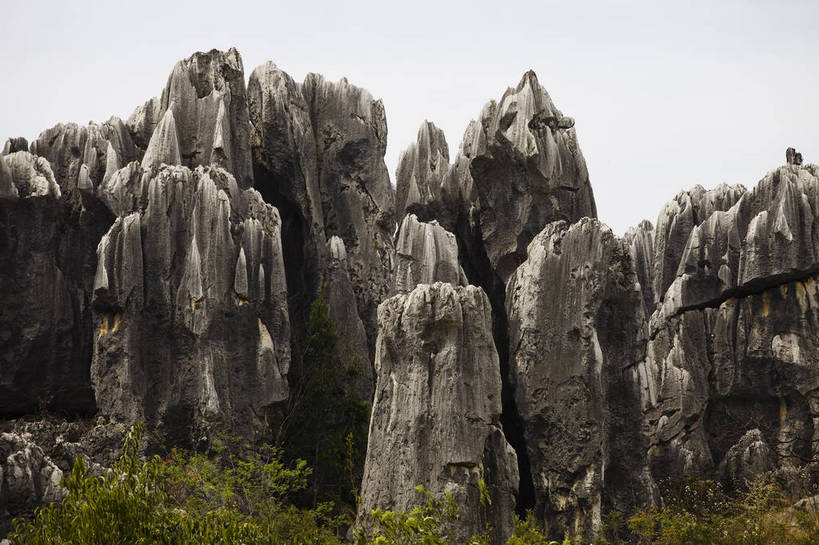 无人,横图,彩色,室外,白天,旅游,度假,石头,名胜古迹,石林,标志建筑,地标,建筑,昆明,中国,亚洲,遗迹,石子,图片,巨石,古迹,文物,娱乐,建设,古建筑,云南,树木,享受,休闲,旅游胜地,放松,摄影,文明,中国文化,自然风光,昆明市,古文明,东亚,云南省,中华人民共和国,省会,西南地区,滇,自然遗产,石林县,石林彝族自治县,石块,岩石,旅行,云南石林地质公园,传统文化,bj174