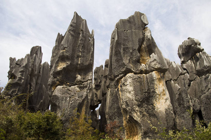 无人,横图,彩色,室外,白天,旅游,度假,石头,名胜古迹,石林,标志建筑,地标,建筑,昆明,中国,亚洲,遗迹,石子,图片,巨石,古迹,文物,娱乐,建设,古建筑,云南,树木,享受,休闲,旅游胜地,放松,摄影,文明,中国文化,自然风光,昆明市,古文明,东亚,云南省,中华人民共和国,省会,西南地区,滇,自然遗产,石林县,石林彝族自治县,石块,岩石,旅行,云南石林地质公园,传统文化,bj174