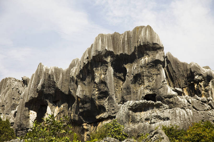 无人,横图,彩色,室外,白天,旅游,度假,石头,名胜古迹,石林,标志建筑,地标,建筑,昆明,中国,亚洲,遗迹,石子,图片,巨石,古迹,文物,娱乐,建设,古建筑,云南,树木,享受,休闲,旅游胜地,放松,摄影,文明,中国文化,自然风光,昆明市,古文明,东亚,云南省,中华人民共和国,省会,西南地区,滇,自然遗产,石林县,石林彝族自治县,石块,岩石,旅行,云南石林地质公园,传统文化,bj174